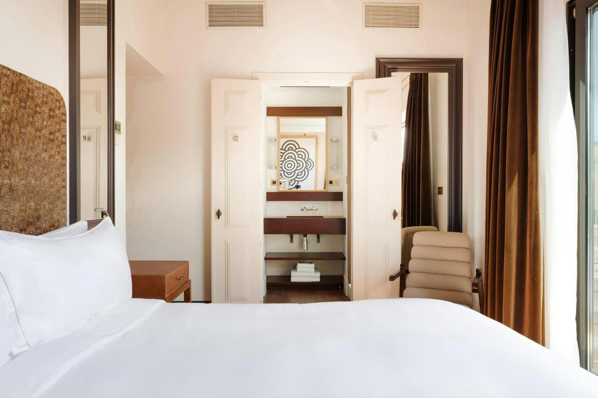 Cama o camas de una habitación en DO Plaça Reial Hotel Gothic Quarter, Sonder by Marriott Bonvoy