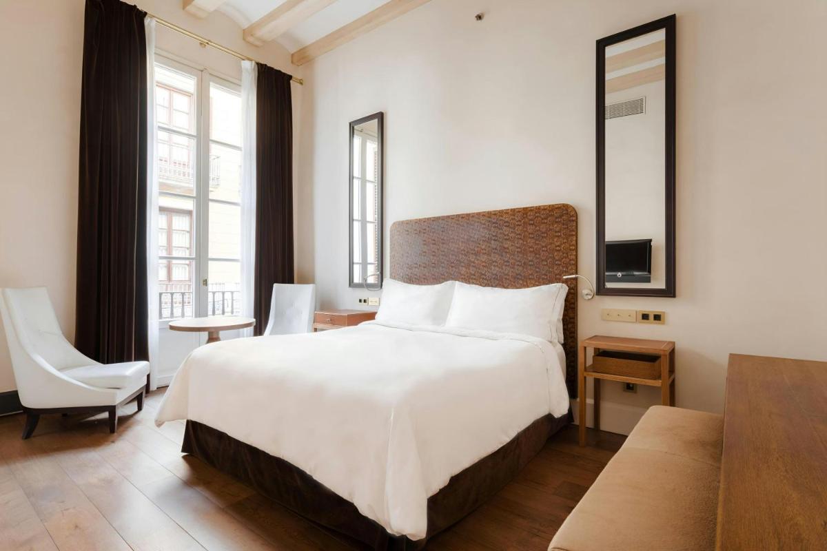 Cama o camas de una habitación en DO Plaça Reial Hotel Gothic Quarter, Sonder by Marriott Bonvoy