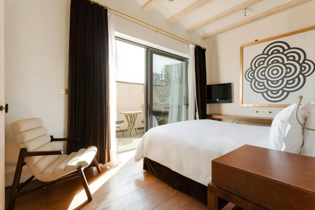 Cama o camas de una habitación en DO Plaça Reial Hotel Gothic Quarter, Sonder by Marriott Bonvoy