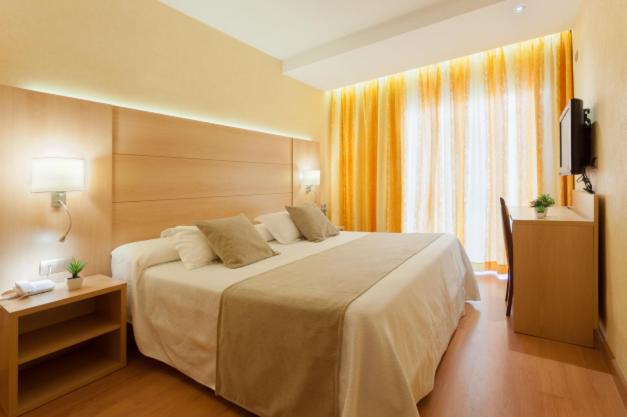 Cama o camas de una habitación en Hotel Pimar & Spa