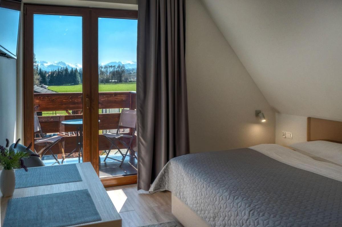 PRZY TERMACH apartamenty, pokoje - podgrzewany basen, hydromasaż i tylko 70m Termy - Housity