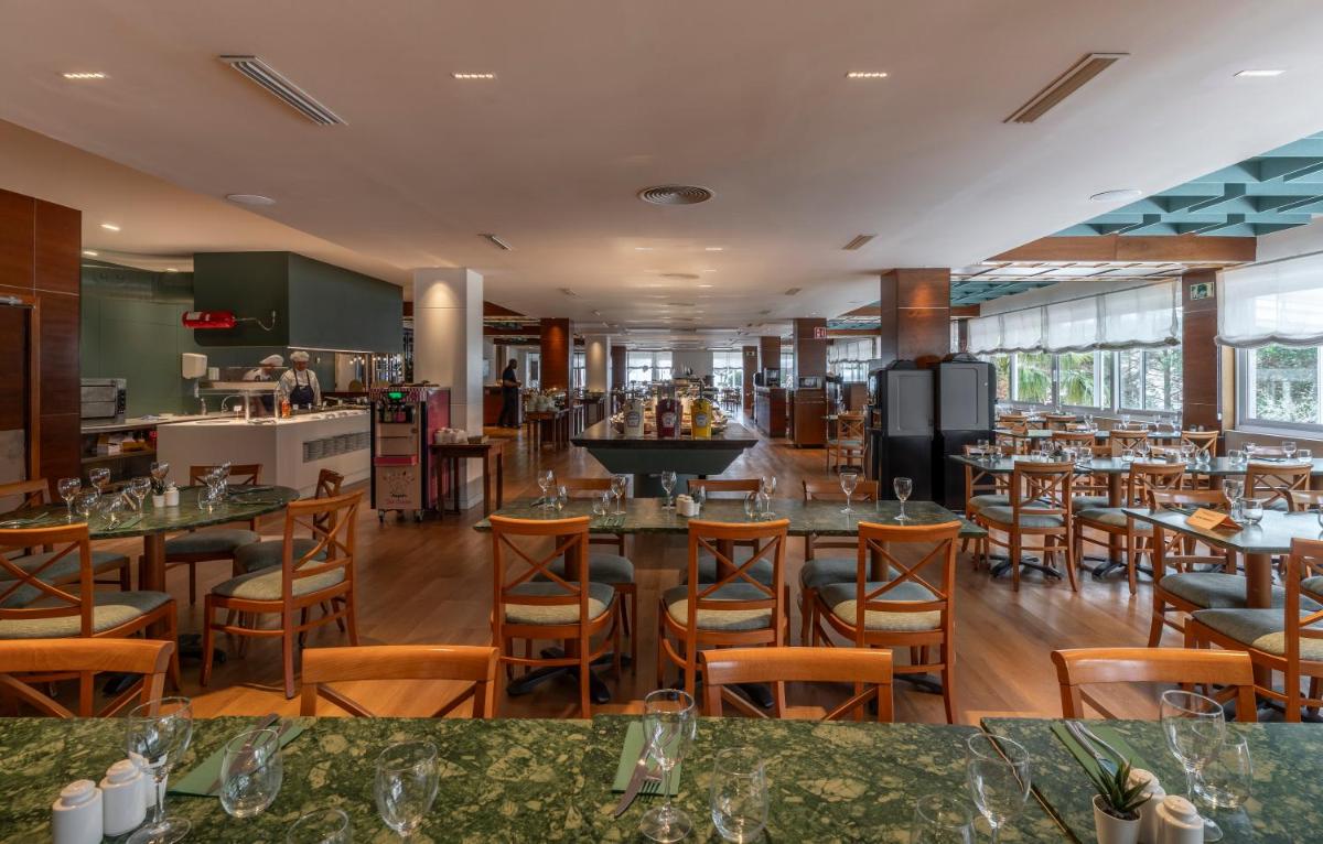Un restaurante o sitio para comer en Prestige Victoria