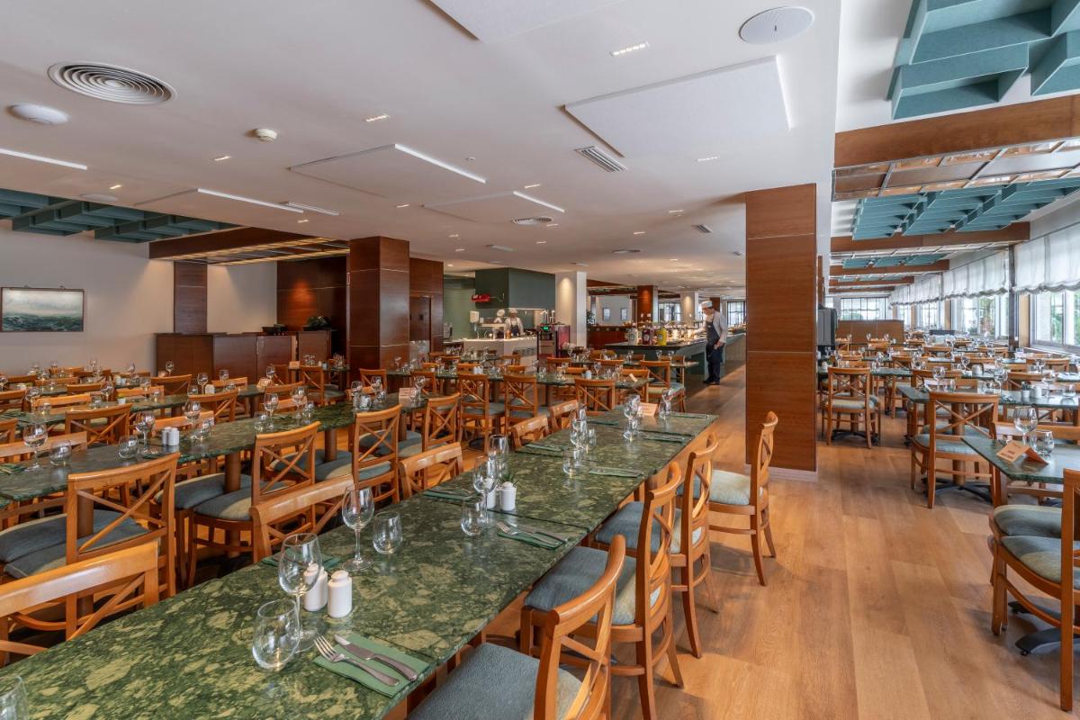 Un restaurante o sitio para comer en Prestige Victoria