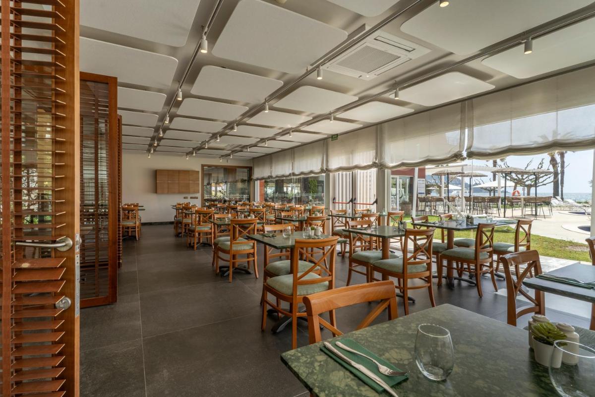 Un restaurante o sitio para comer en Prestige Victoria