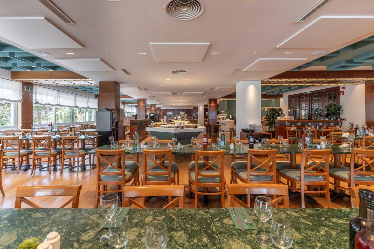 Un restaurante o sitio para comer en Prestige Victoria