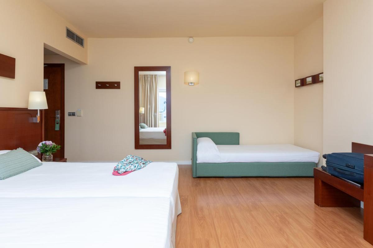 Cama o camas de una habitación en Prestige Victoria