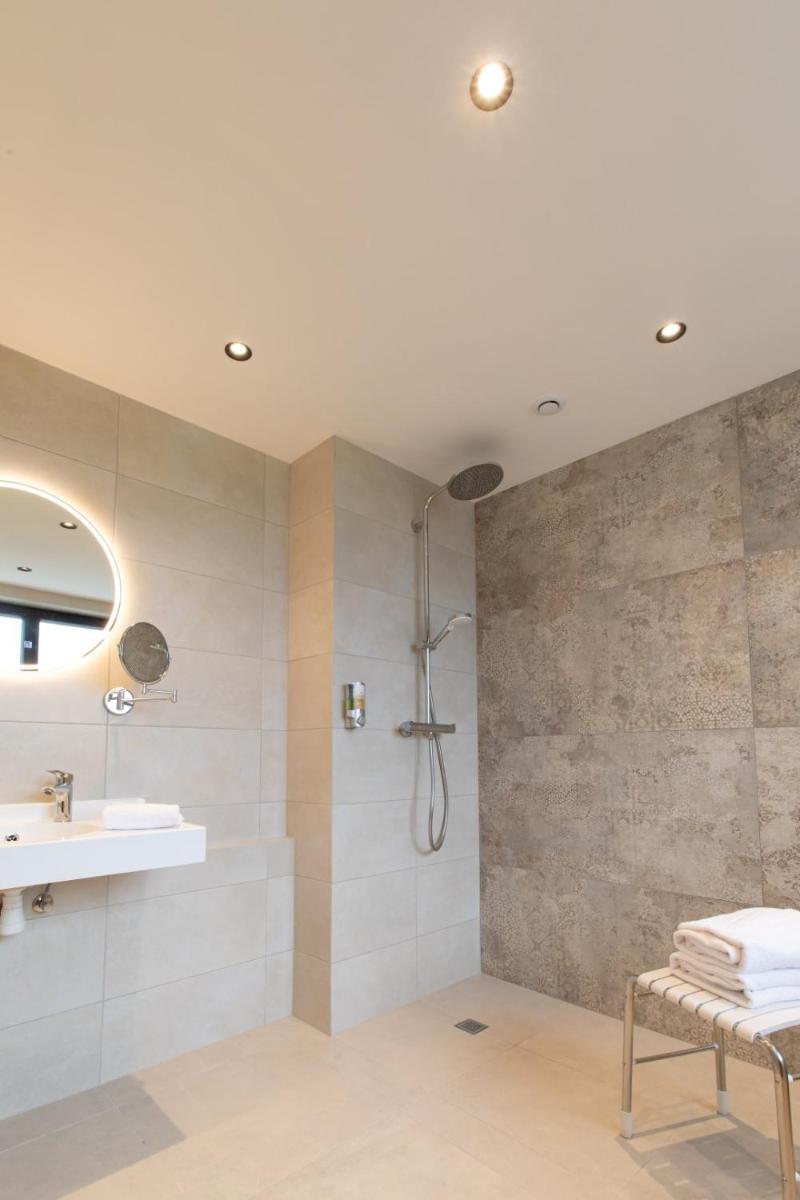 Salle de bains dans l'établissement Hôtel Terra Vinum