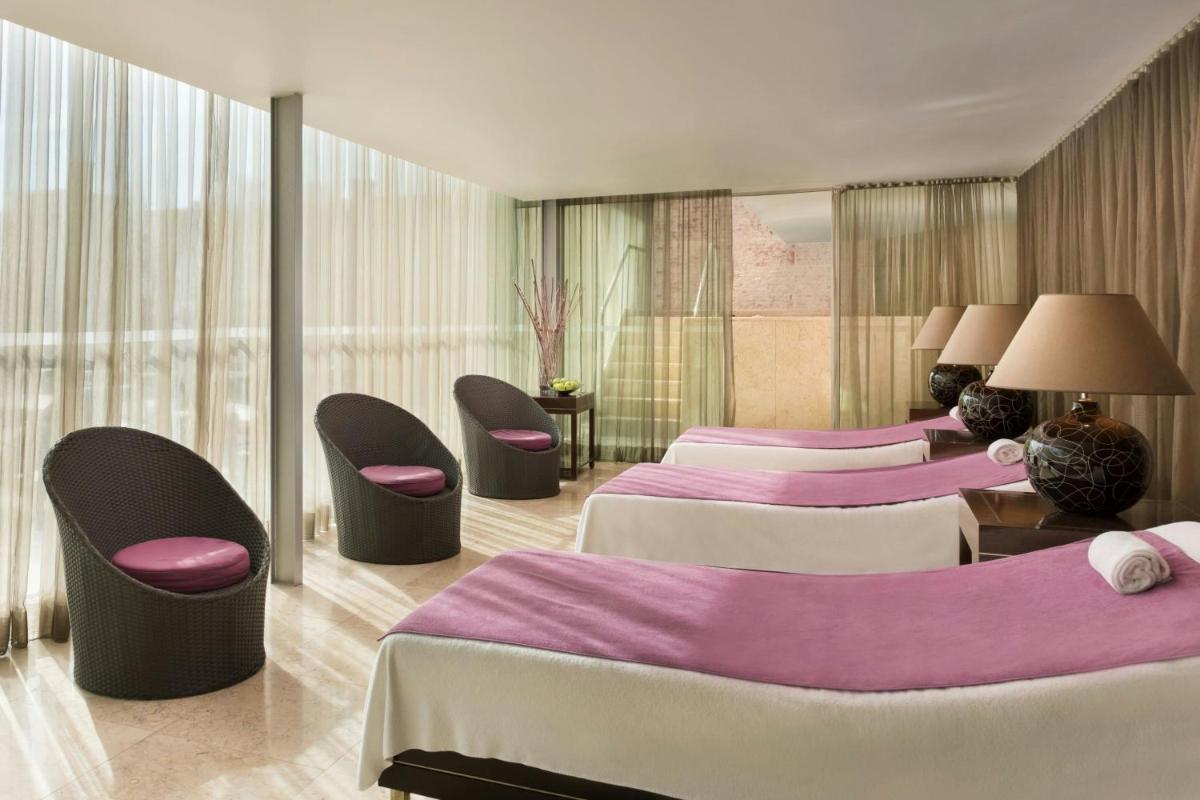 Uma cama ou camas num quarto em Sheraton Lisboa Hotel & Spa