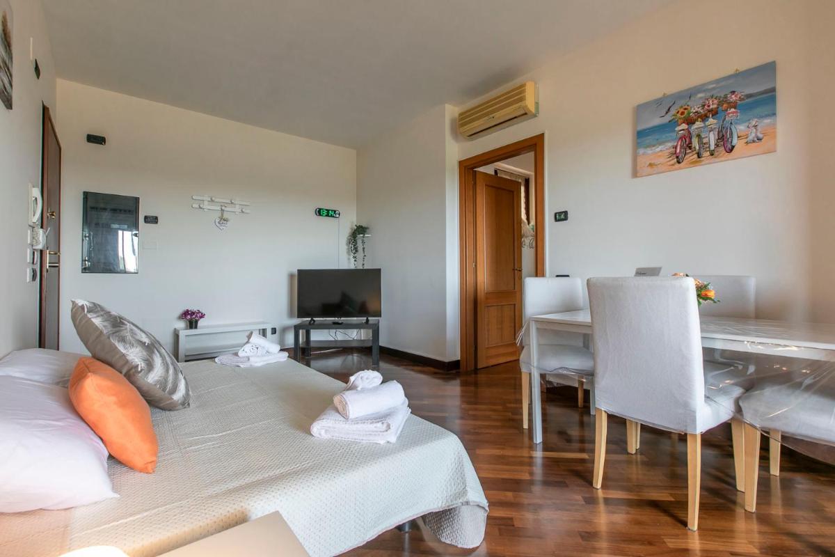 Alloggio turistico Leonardo Home- Fiumicino Airport, 2m in treno- Rome, 20m in treno- Fiera, 2m in treno - Housity