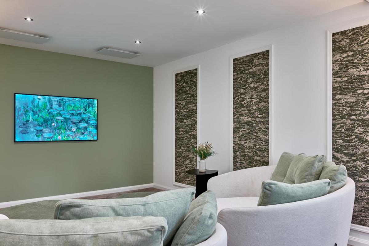 Télévision ou salle de divertissement dans l'établissement Maison Zugno Hôtel & Spa