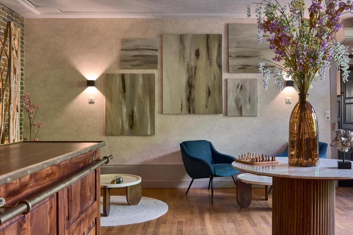 Coin salon dans l'établissement Maison Zugno Hôtel & Spa