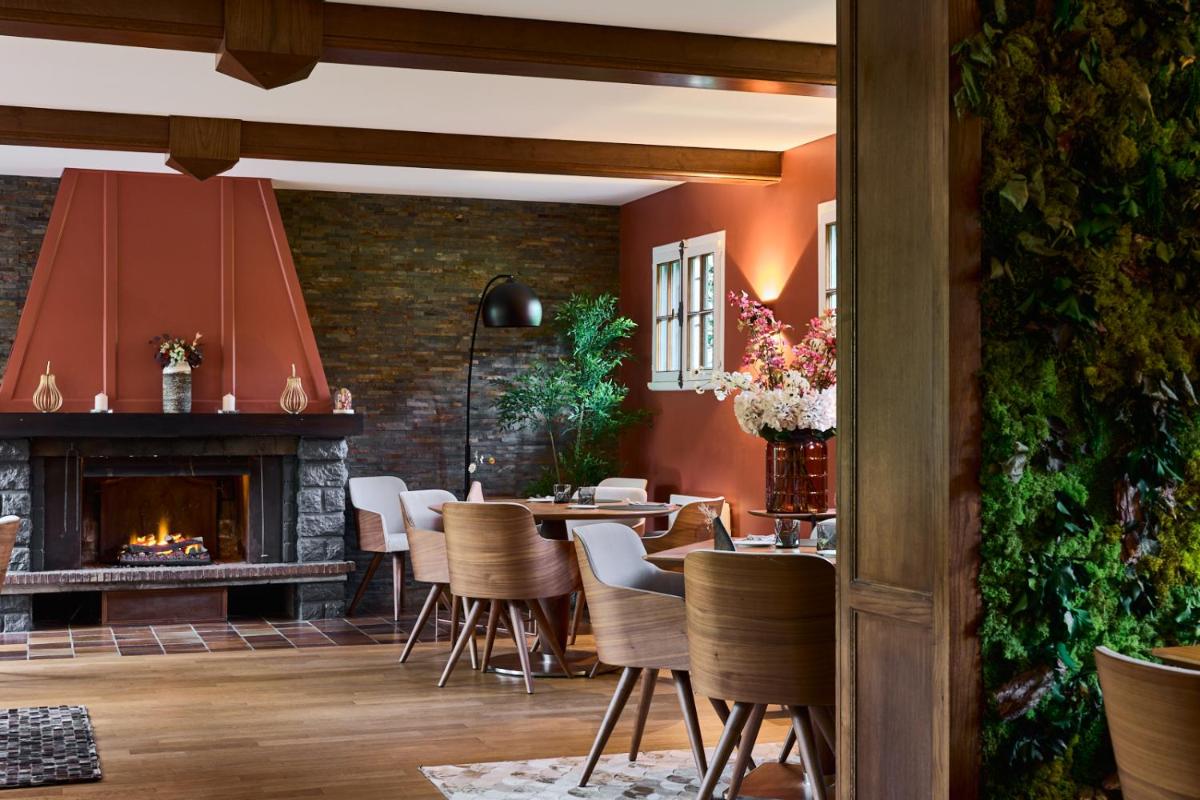Coin salon dans l'établissement Maison Zugno Hôtel & Spa