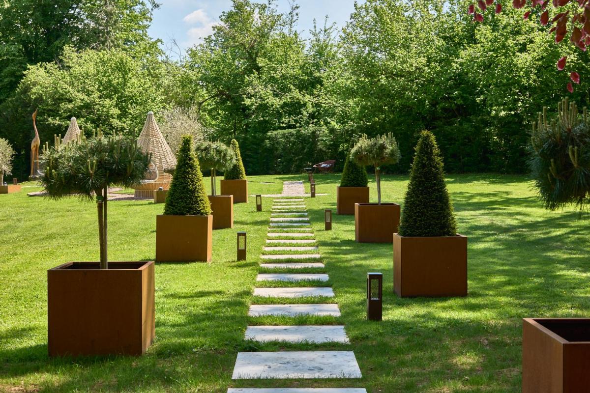 Jardin de l'établissement Maison Zugno Hôtel & Spa