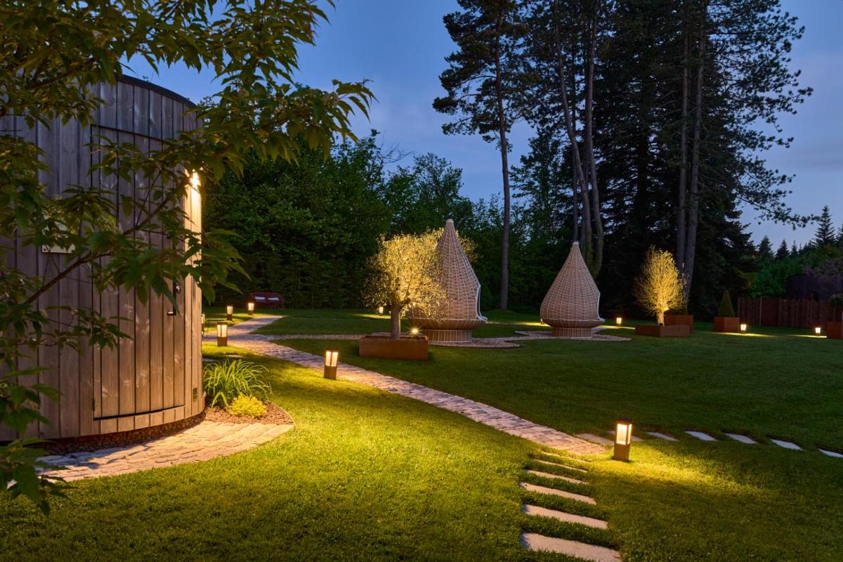 Jardin de l'établissement Maison Zugno Hôtel & Spa