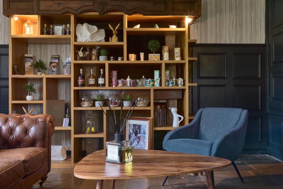 Coin salon dans l'établissement Maison Zugno Hôtel & Spa