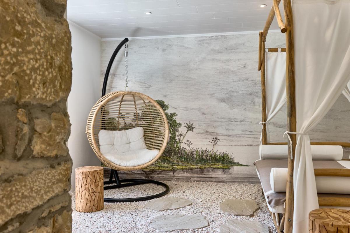 Photo de la galerie de l'établissement Maison Zugno Hôtel & Spa, à Barretaine