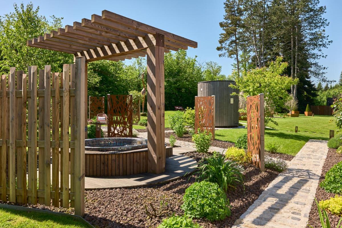 Jardin de l'établissement Maison Zugno Hôtel & Spa