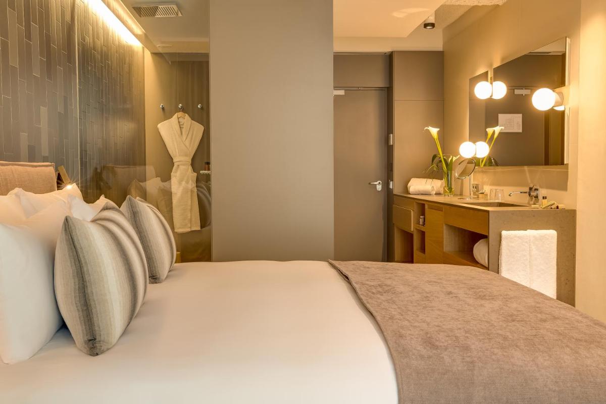 Cama o camas de una habitación en Ohla Eixample
