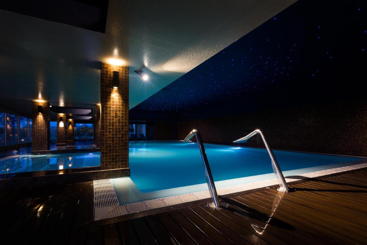 A piscina em ou perto de Santana Hotel & SPA