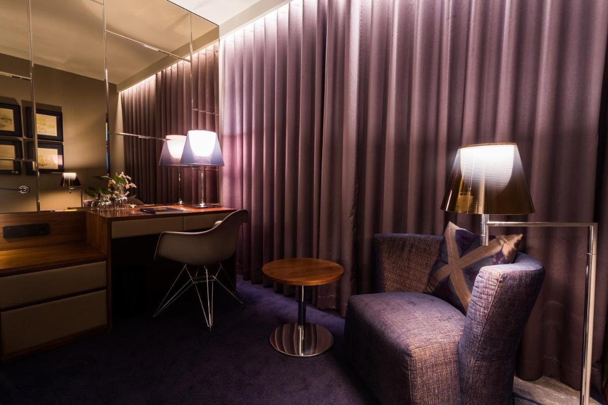 Uma área de estar em Santana Hotel & SPA