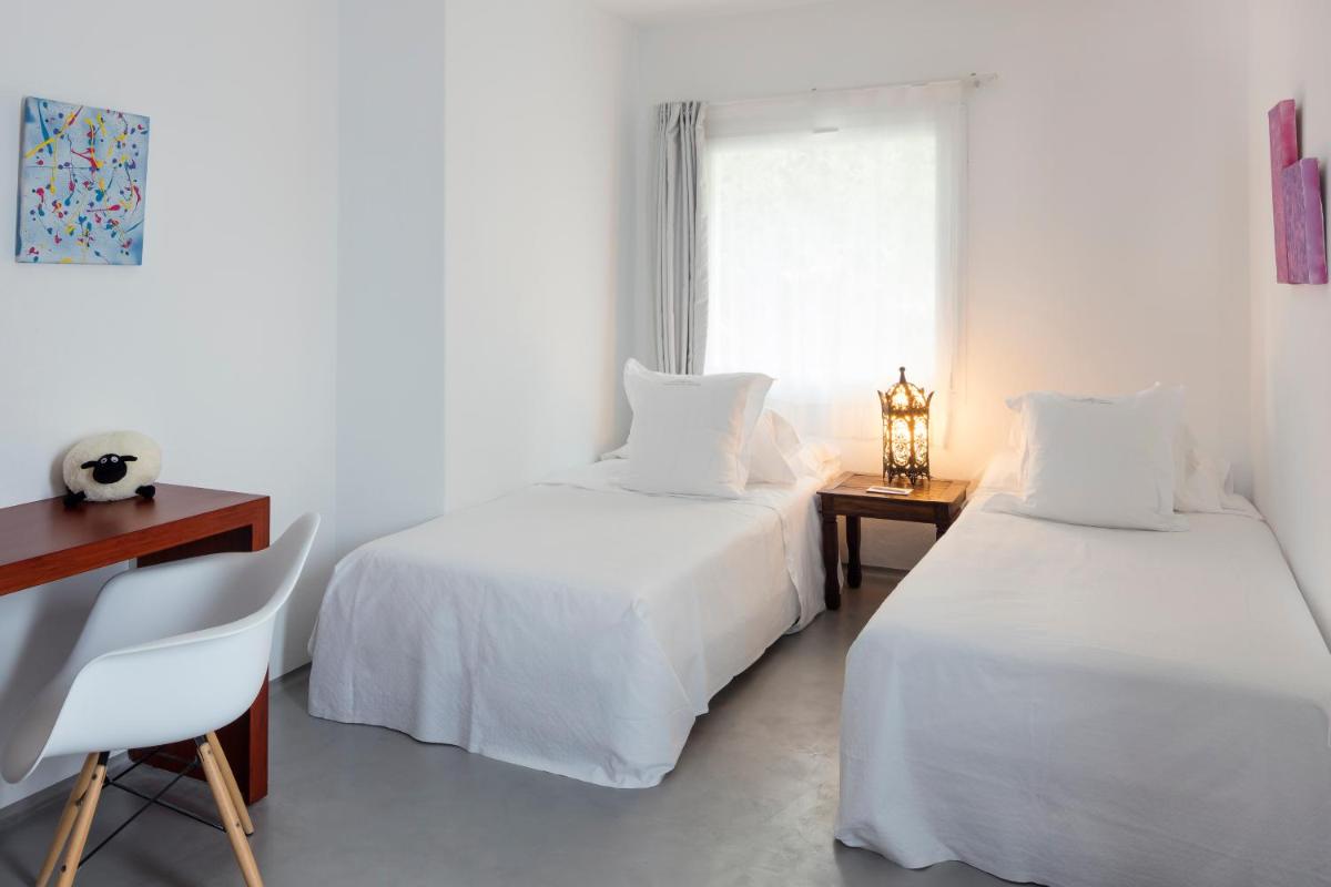 Cama o camas de una habitación en Hacienda Na Xamena, Ibiza