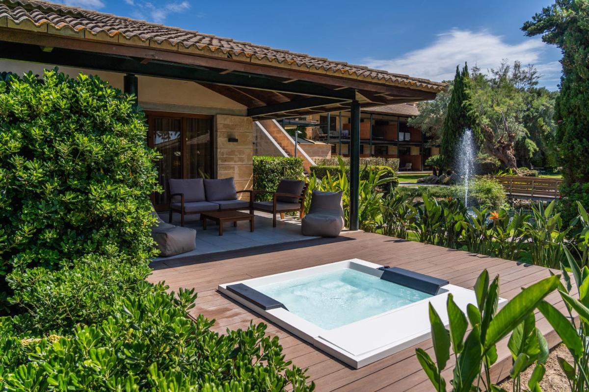 Jardín al aire libre en PortBlue Club Pollentia Resort & Spa