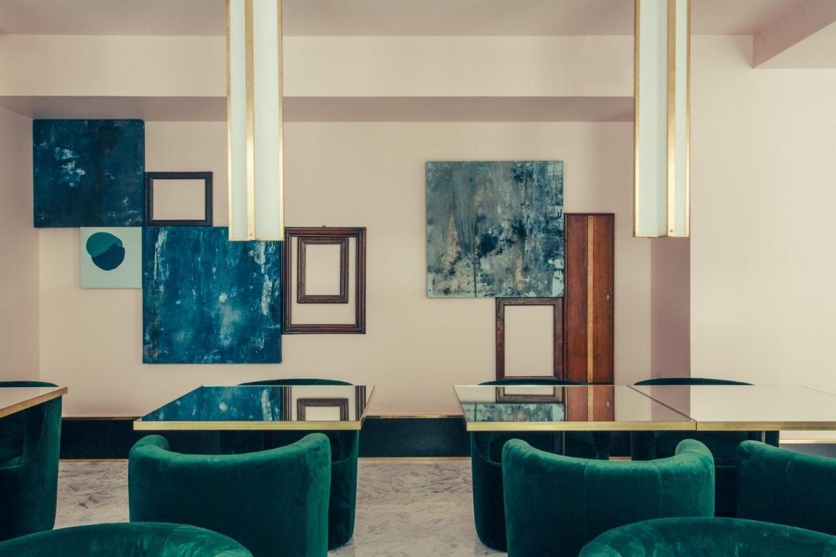 Coin salon dans l'établissement Hôtel Saint-Marc
