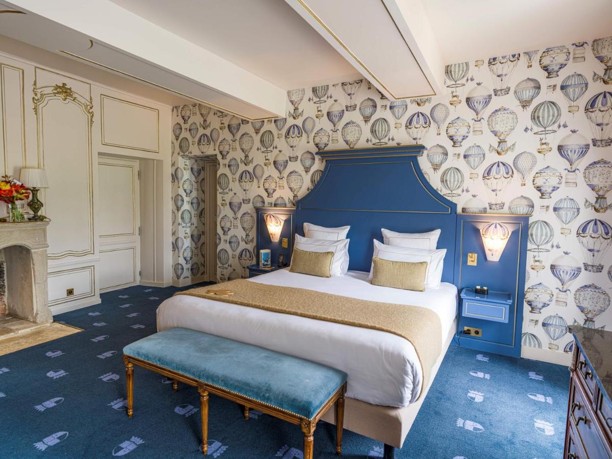 Un ou plusieurs lits dans un hébergement de l'établissement Chateau d'Audrieu