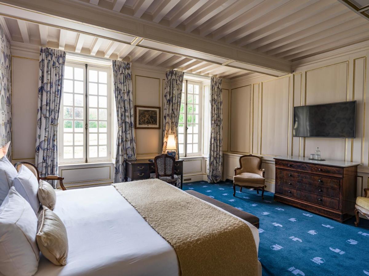 Un ou plusieurs lits dans un hébergement de l'établissement Chateau d'Audrieu