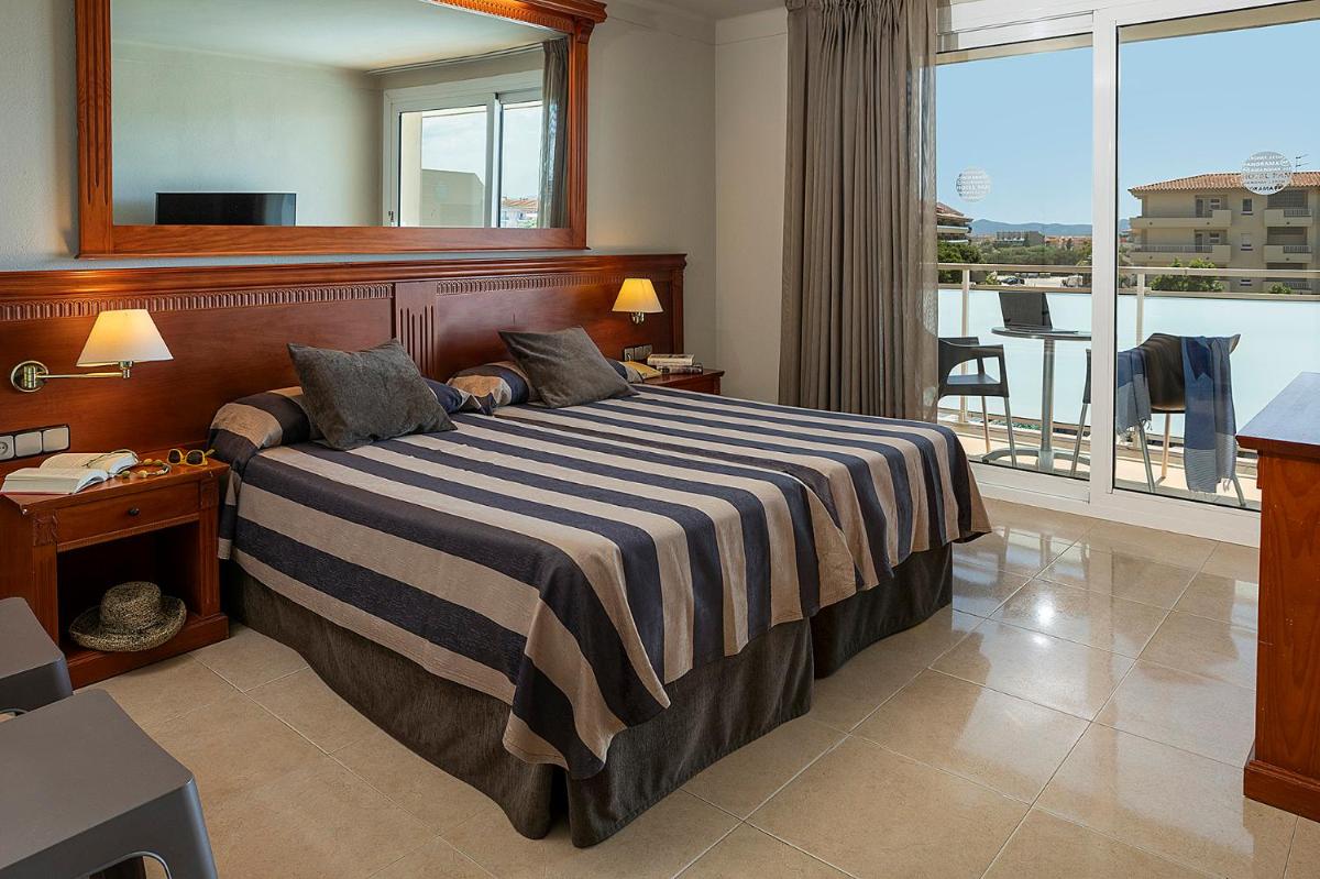 Cama o camas de una habitación en Hotel Panorama