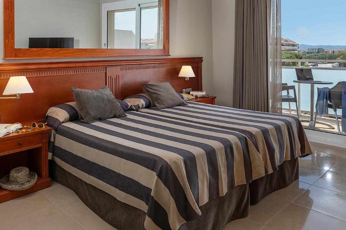Cama o camas de una habitación en Hotel Panorama