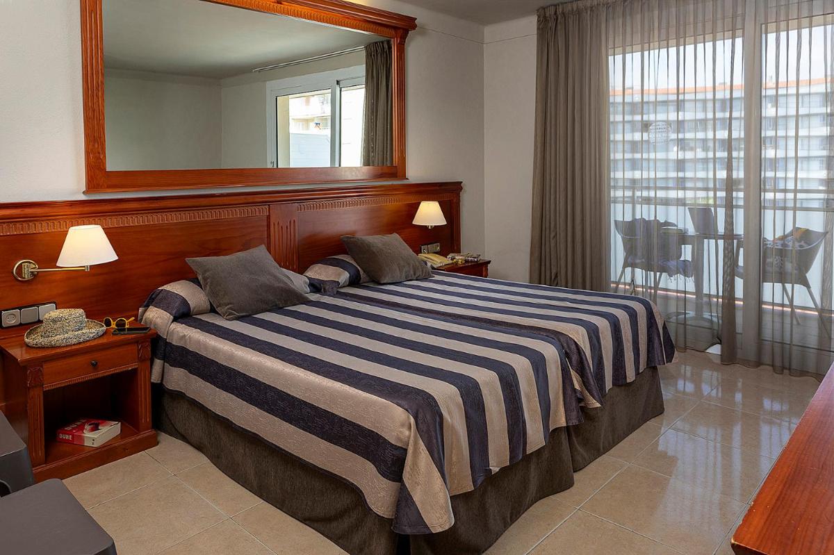 Cama o camas de una habitación en Hotel Panorama