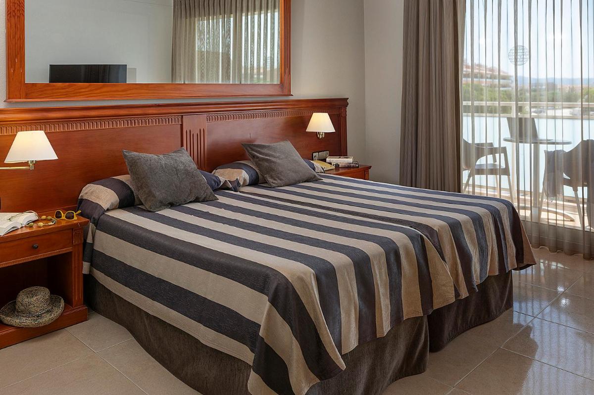 Cama o camas de una habitación en Hotel Panorama
