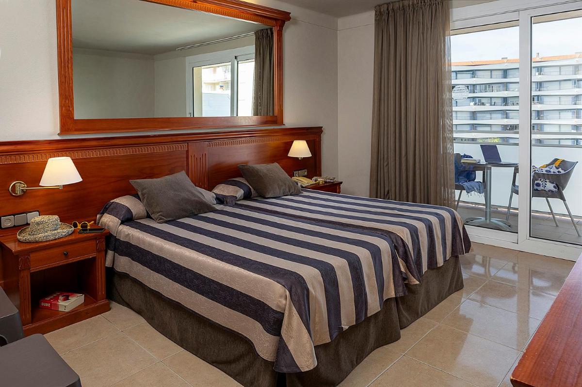 Cama o camas de una habitación en Hotel Panorama