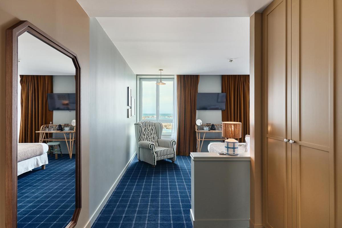Un ou plusieurs lits dans un hébergement de l'établissement Hôtel de la Mer & Spa