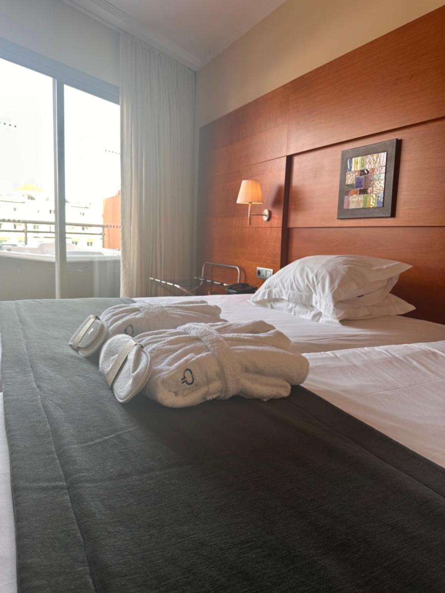 Cama o camas de una habitación en Protur Roquetas Hotel & Spa