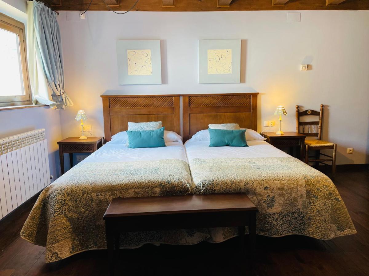 Cama o camas de una habitación en Tierras De Arán