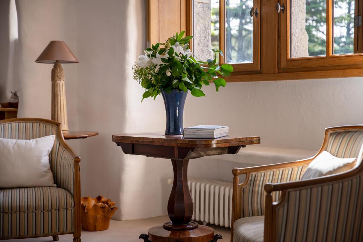 Coin salon dans l'établissement Château De Riell