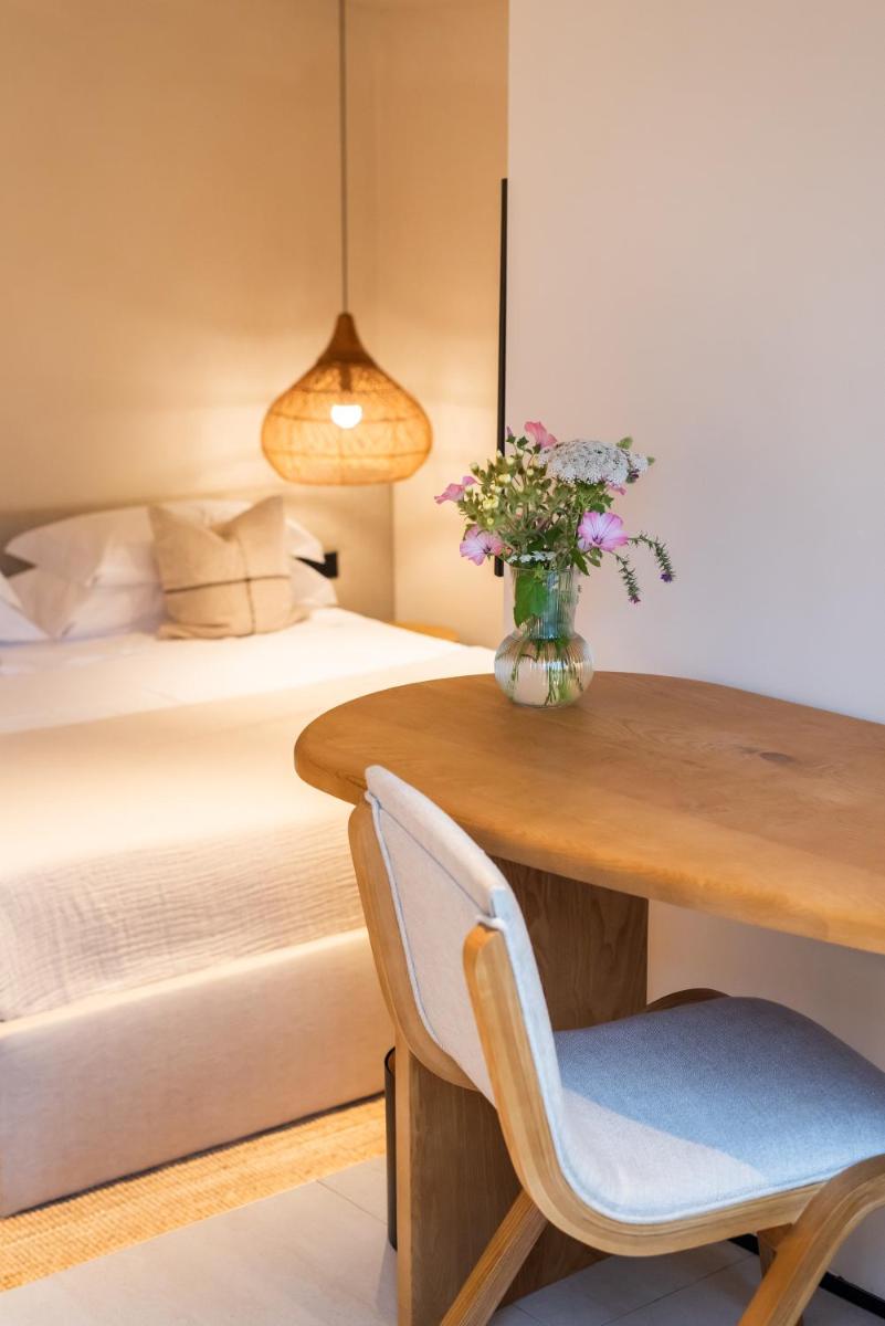 Uma cama ou camas num quarto em DOMA Portugal