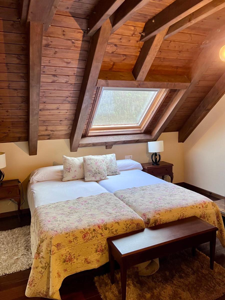 Cama o camas de una habitación en Tierras De Arán