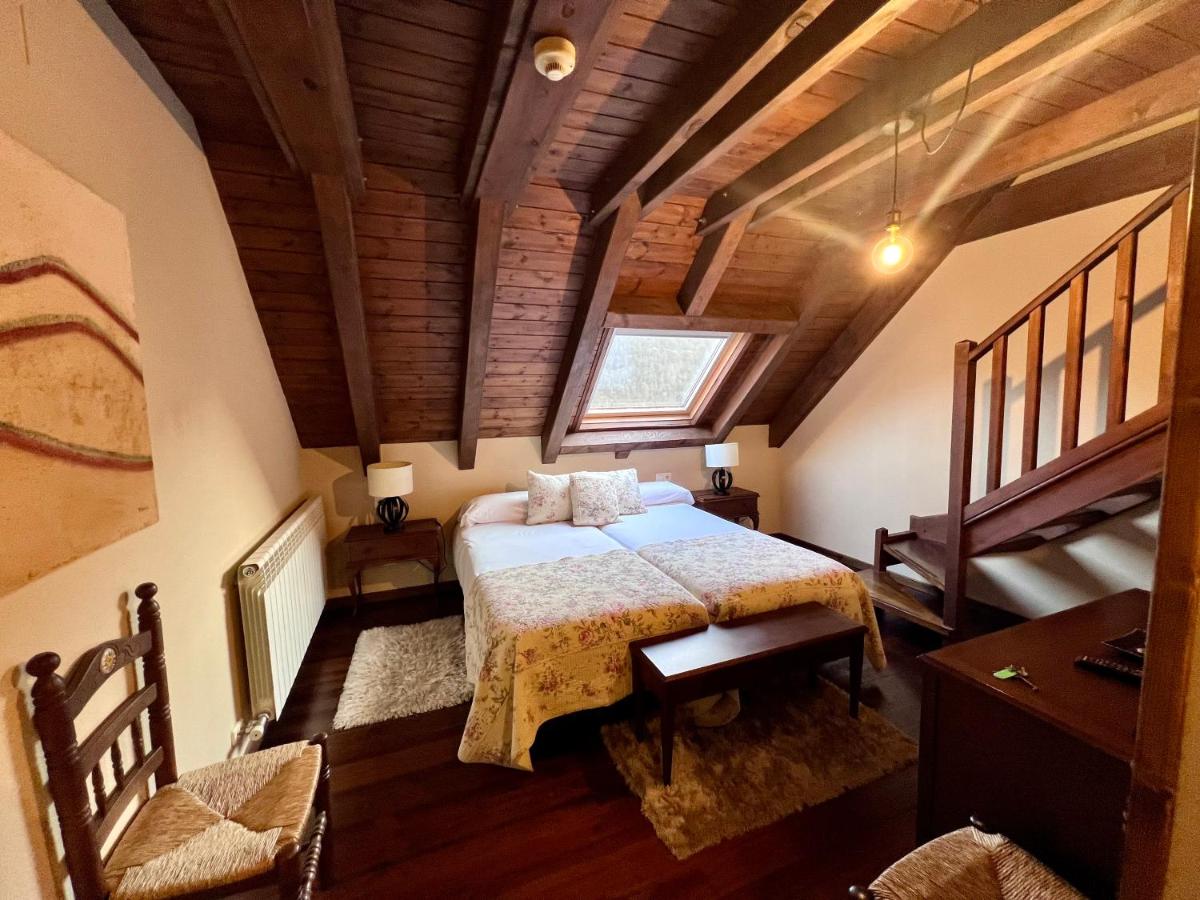Cama o camas de una habitación en Tierras De Arán