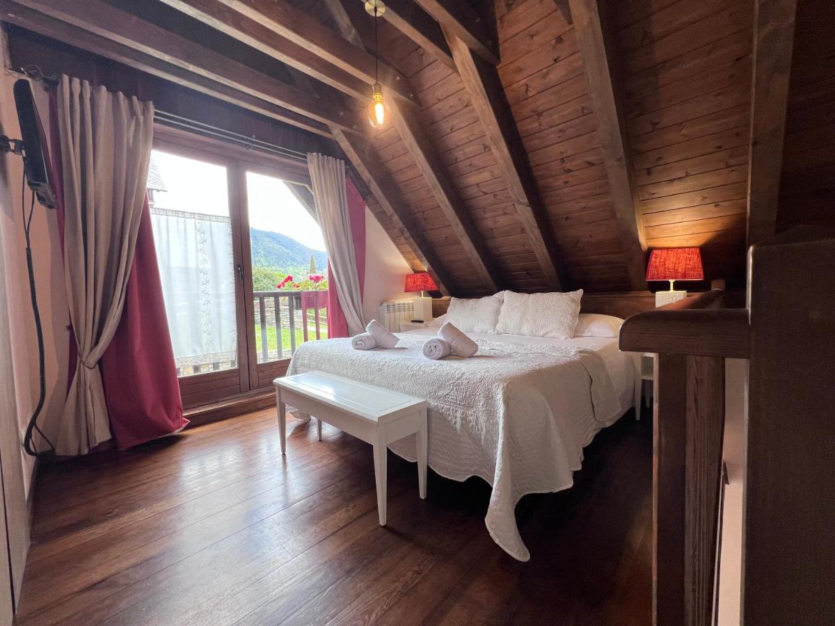 Cama o camas de una habitación en Tierras De Arán