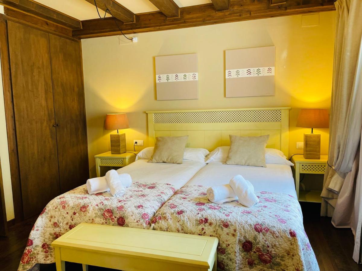 Cama o camas de una habitación en Tierras De Arán