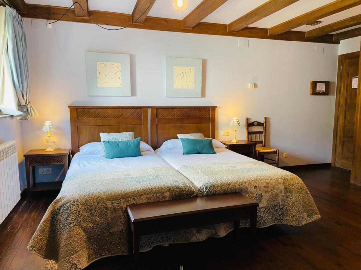 Cama o camas de una habitación en Tierras De Arán