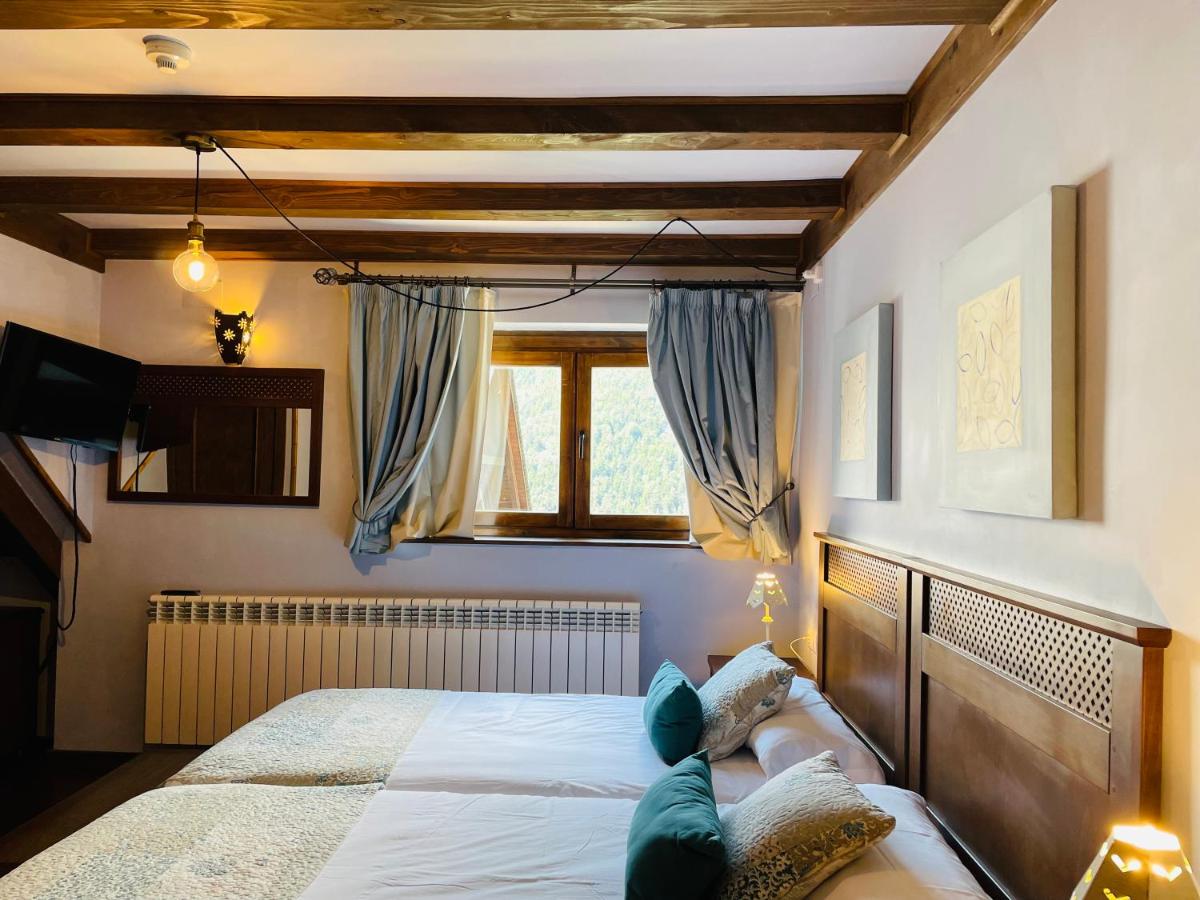 Cama o camas de una habitación en Tierras De Arán