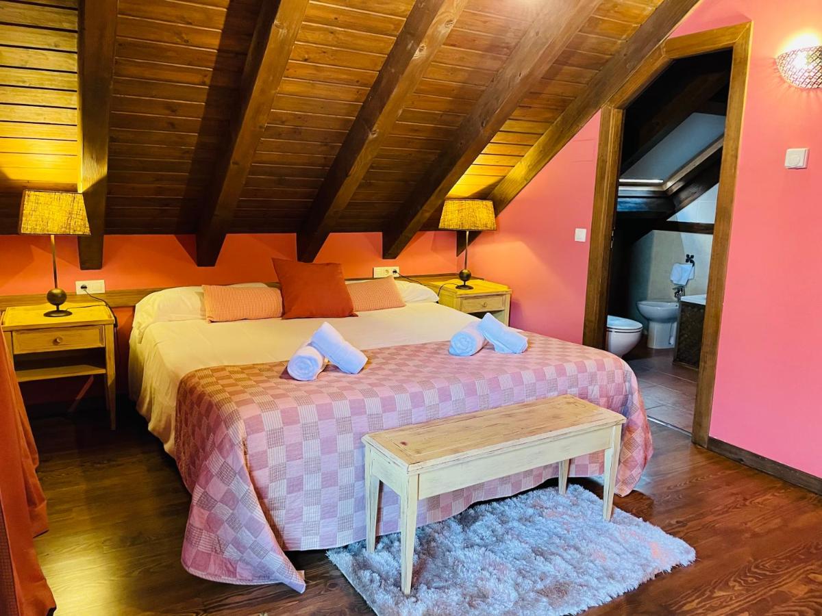 Cama o camas de una habitación en Tierras De Arán
