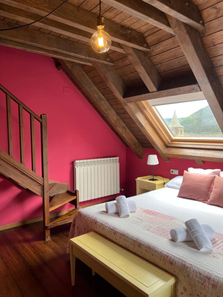 Cama o camas de una habitación en Tierras De Arán