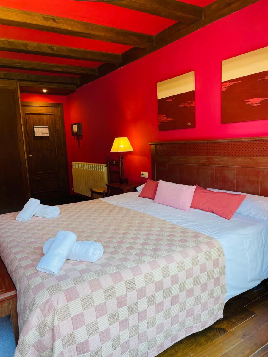 Cama o camas de una habitación en Tierras De Arán