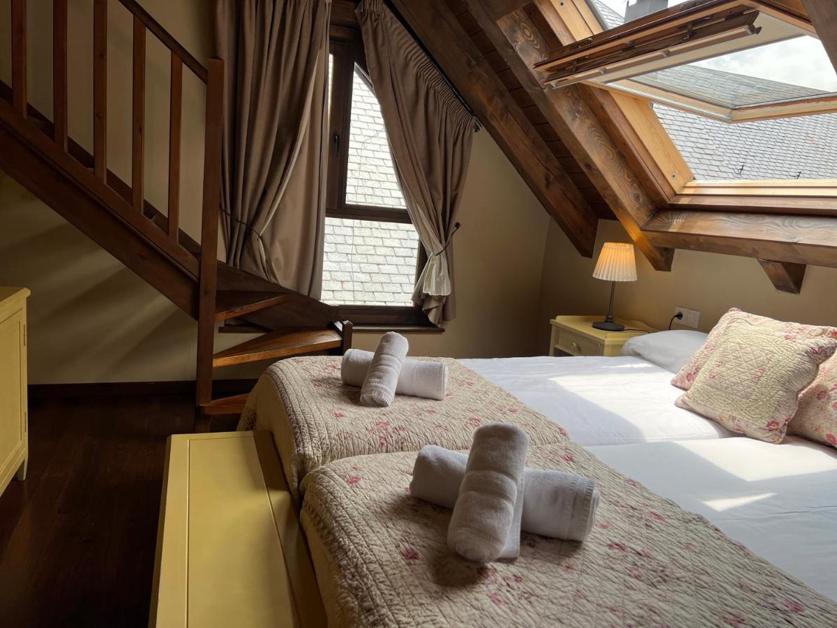 Cama o camas de una habitación en Tierras De Arán