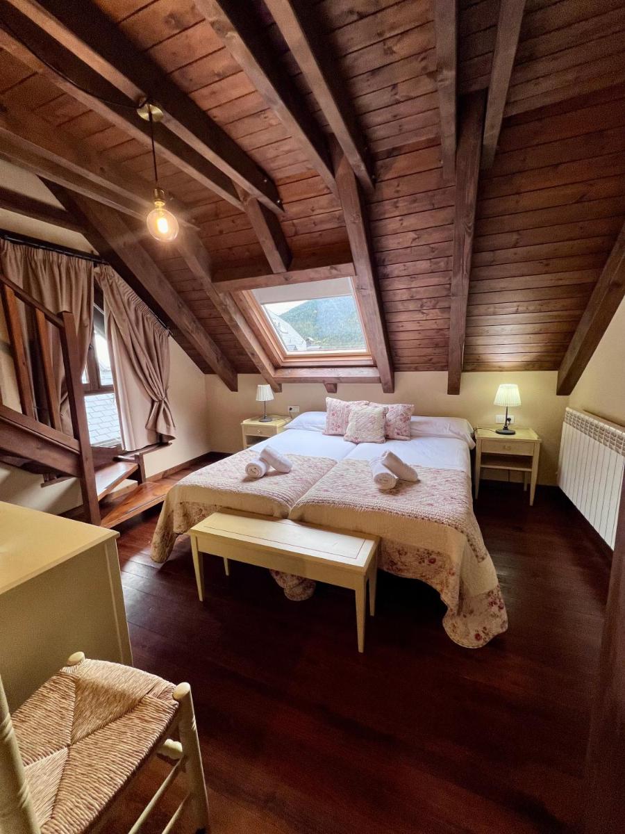 Cama o camas de una habitación en Tierras De Arán